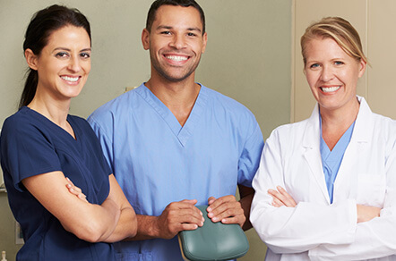 smiling dental team members